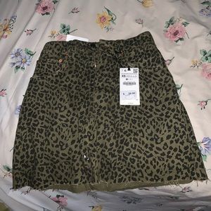 Olive green Cheetah print mini skirt.